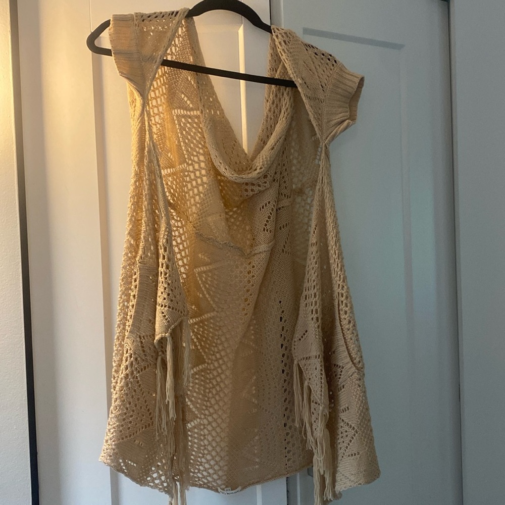 Beautiful crocheted shawl with arm holes